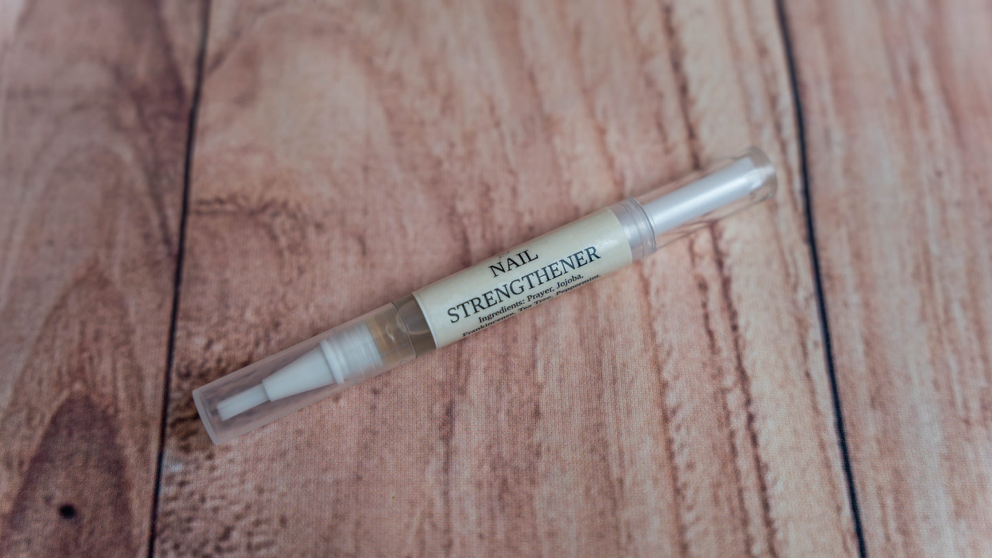 A Wright Creation Nail Strengthener Serum in a clear, eco-friendly applicator pen, infused with natural jojoba oil and plant-based ingredients to nourish and strengthen brittle nails, ideal for sensitive skin and holistic nail care.