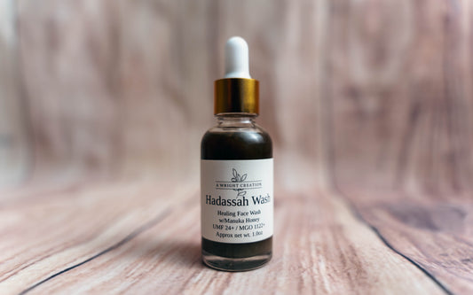 A Wright Creation Hadassah Healing Face Wash with Manuka honey, featuring a dropper bottle in eco-friendly packaging, formulated to soothe, heal, and hydrate sensitive skin, ideal for eczema, psoriasis, and dry skin care.