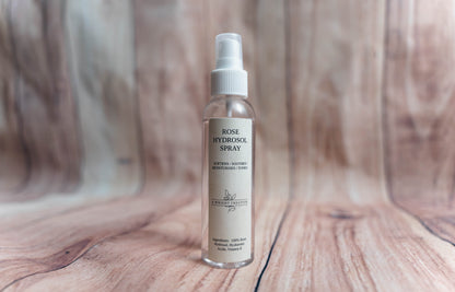 A Wright Creation Rose Hydrosol Spray in eco-friendly packaging, formulated with 100% rose hydrosol, hyaluronic acid, and vitamin E to soothe, tone, and moisturize sensitive skin, ideal for eczema, psoriasis, and dry skin relief.