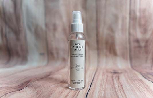 A Wright Creation Rose Hydrosol Spray in eco-friendly packaging, formulated with 100% rose hydrosol, hyaluronic acid, and vitamin E to soothe, tone, and moisturize sensitive skin, ideal for eczema, psoriasis, and dry skin relief.